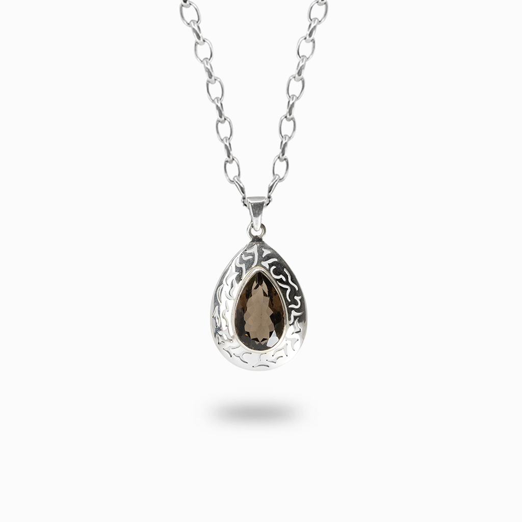 Faceted pear-shaped dark brown Smoky Quartz pendant necklace in an ornate sterling silver openwork teardrop setting.