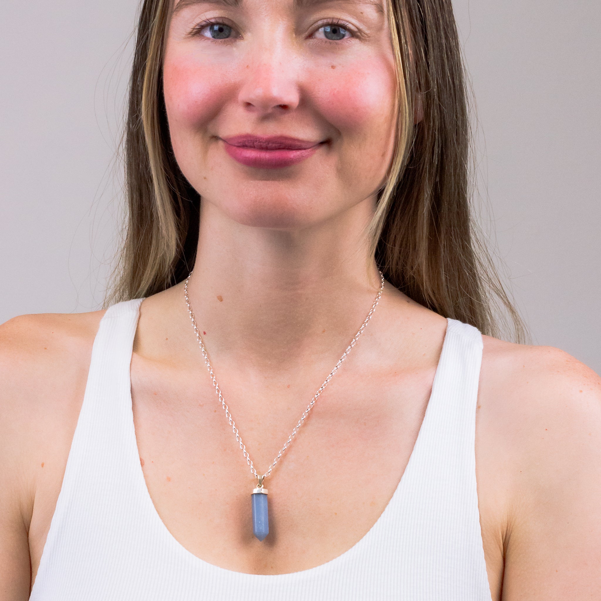 ANGELITE NECKLACE ON MODEL