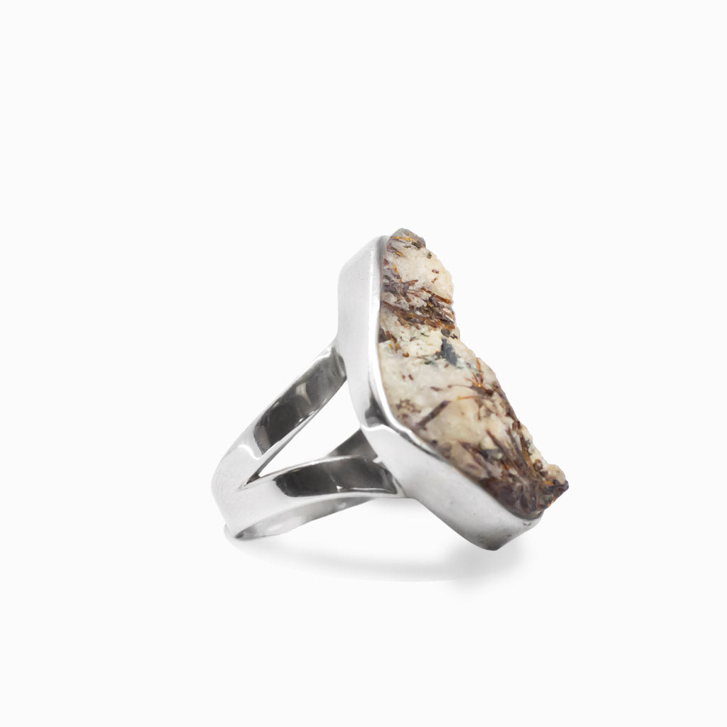 Freeform Astrophyllite gemstone ring with natural bronze inclusions in sterling silver.