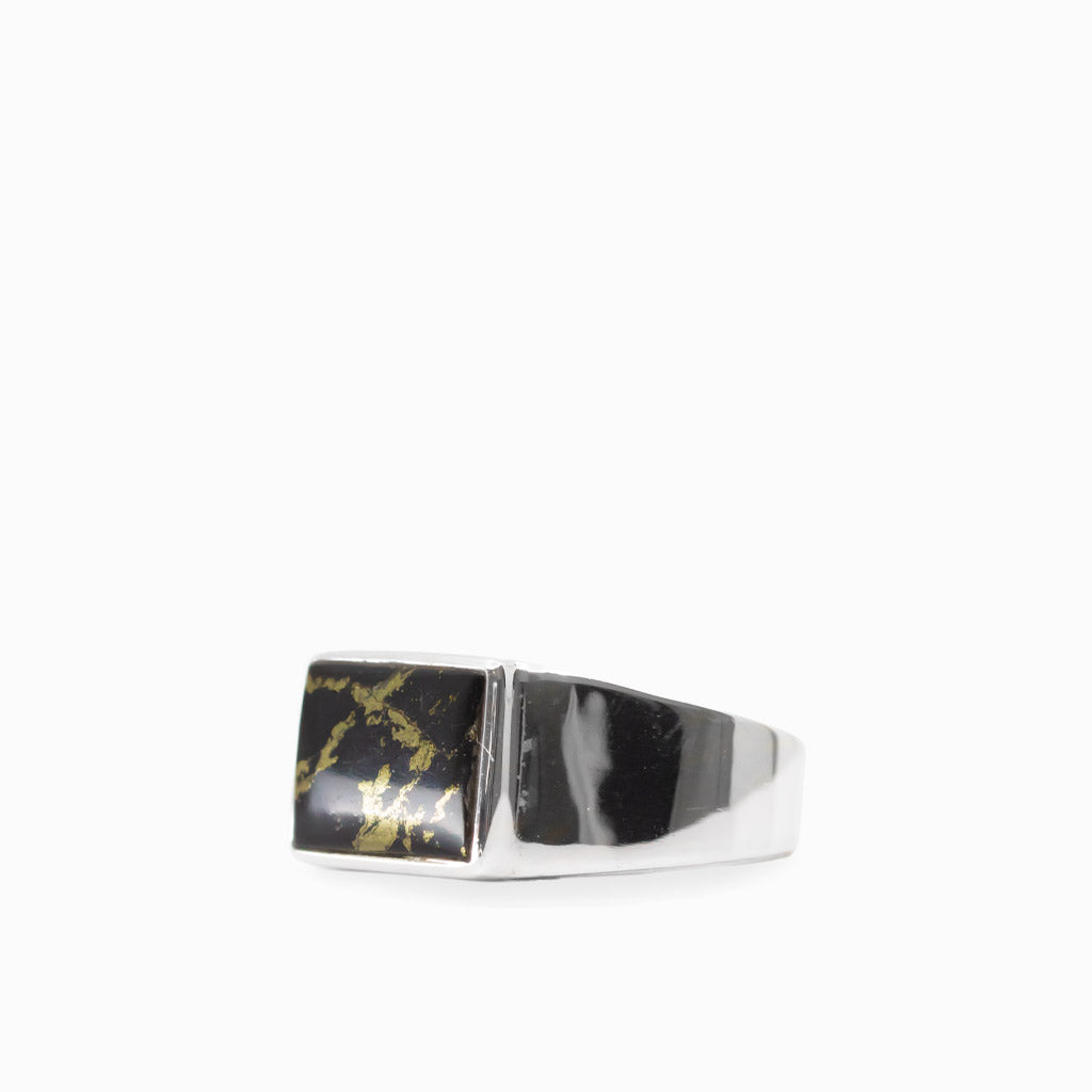 Rectangular black and metallic gold Apache Gold cabochon set in a polished 925 sterling silver ring.