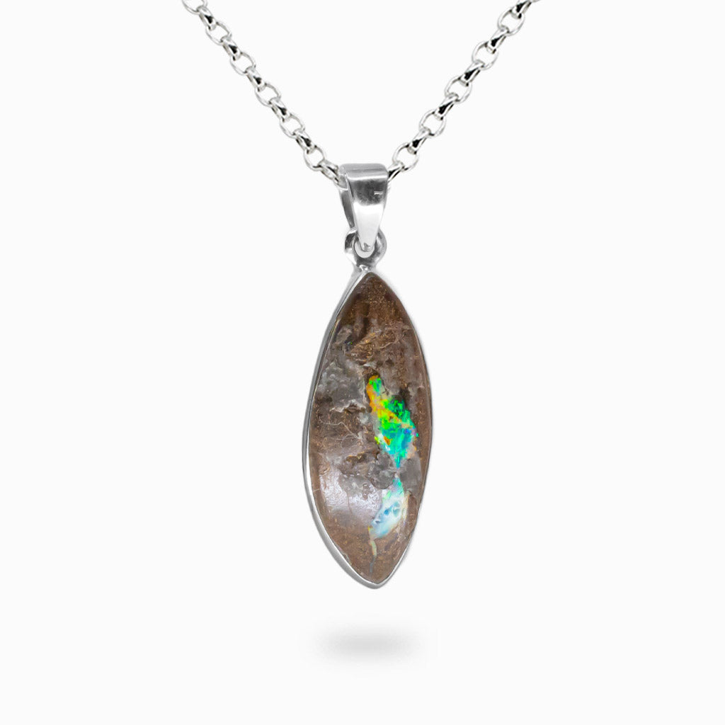 Organic shape Boulder Opal necklace with blue and green flashes running through brown ironstone matrix set in sterling silver