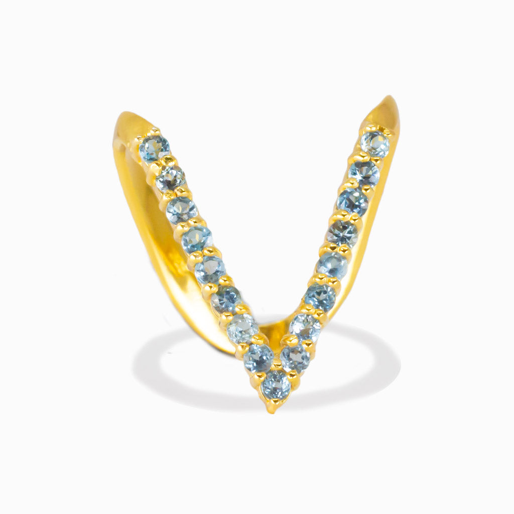 Dazzling Blue Topaz V-Shaped gold vermeil ring. A radiant gemstone of love, success, confidence, and manifestation. Modern chevron design with brilliant sparkle. | MADE IN EARTH