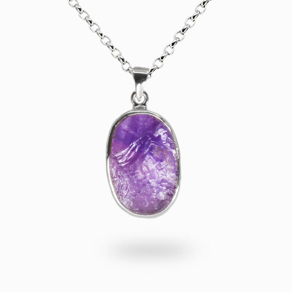 Raw oval amethyst necklace with natural purple crystal in sterling silver bezel, spiritual healing gemstone jewelry. | MADE IN EARTH