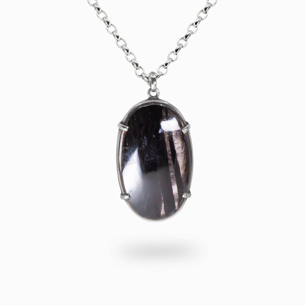 Oval hypersthene cabochon pendant set in sterling silver on chain. MADE IN EARTH