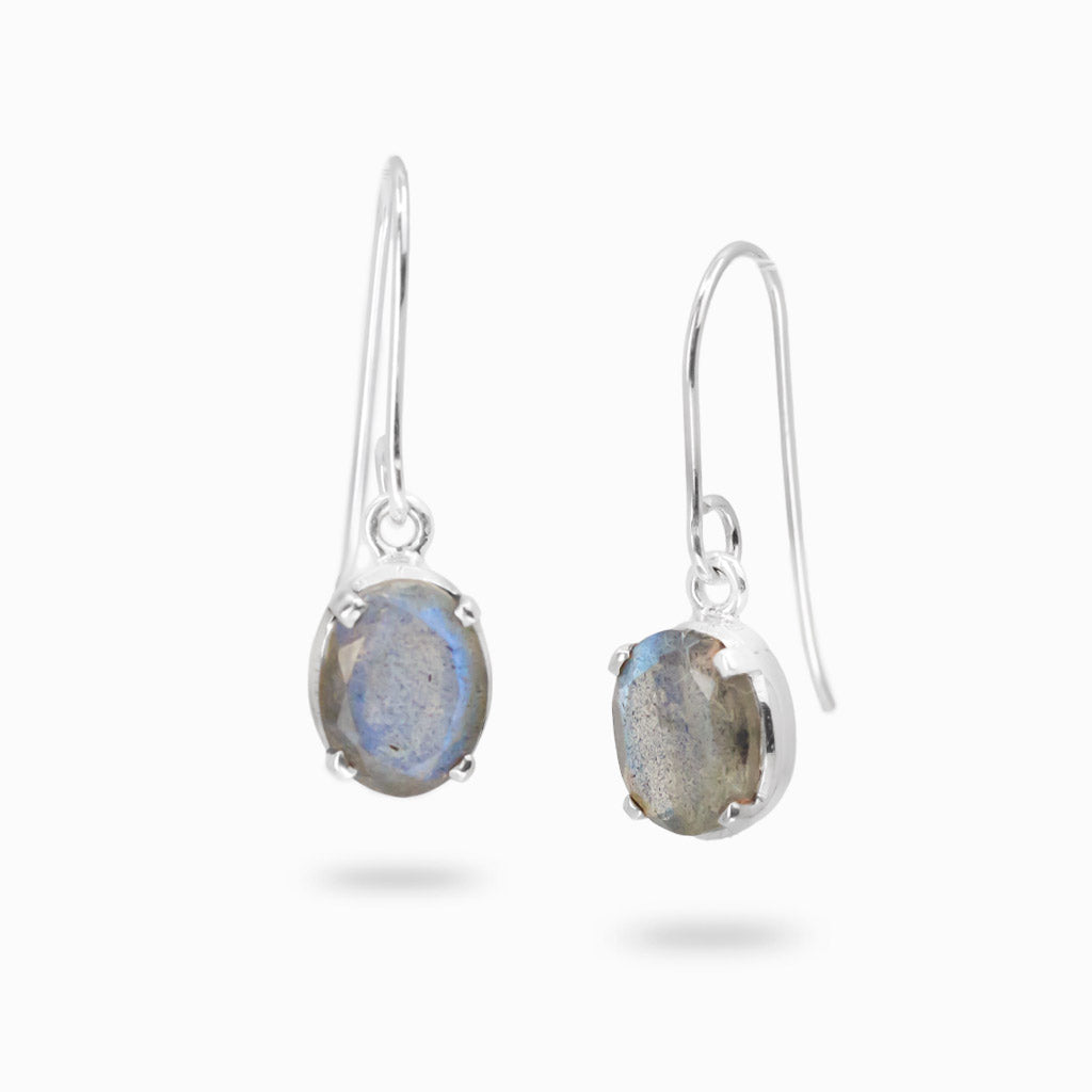 Sterling silver drop earrings featuring faceted oval Labradorite gemstones with natural iridescence.