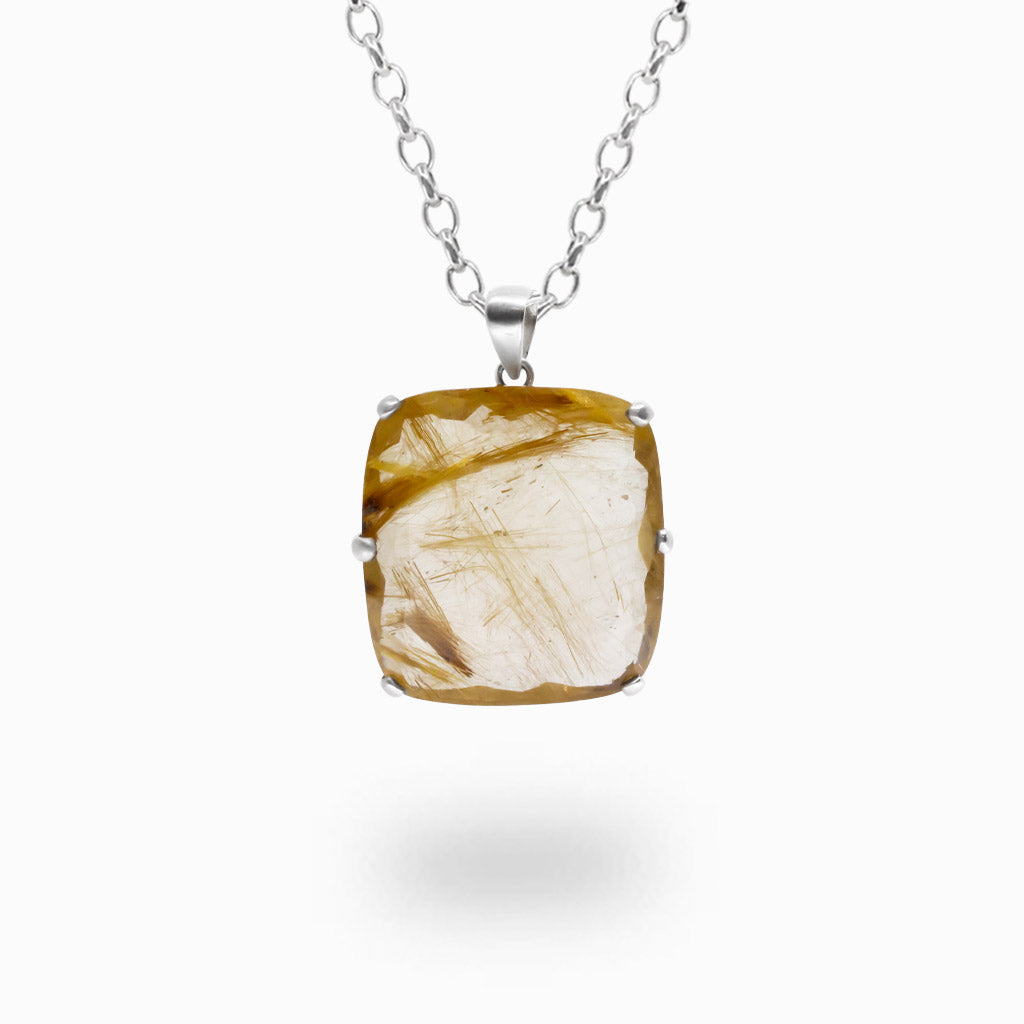 Golden Rutilated Quartz necklace in sterling silver. Natural quartz pendant displaying golden rutile inclusions and brilliant clarity.