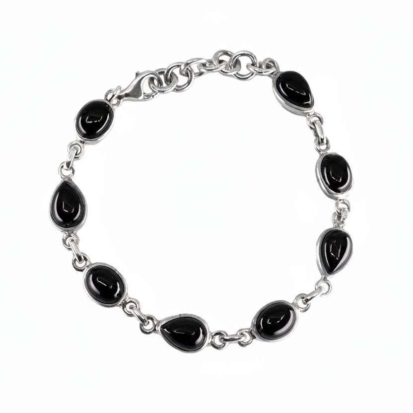 Multishape black onyx bracelet with cabochon stones set in sterling silver