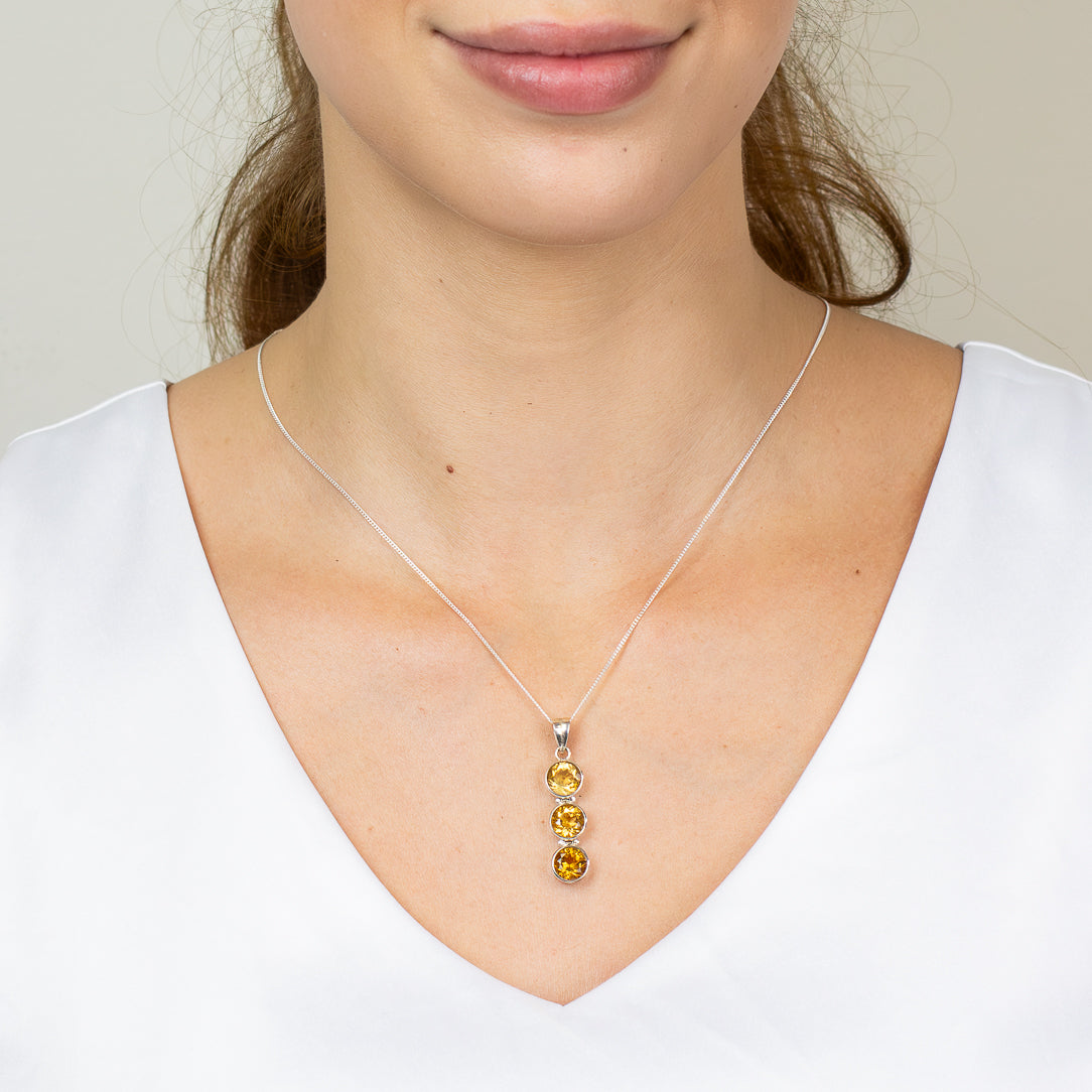 Faceted triple drop citrine necklace in sterling silver ON MODEL