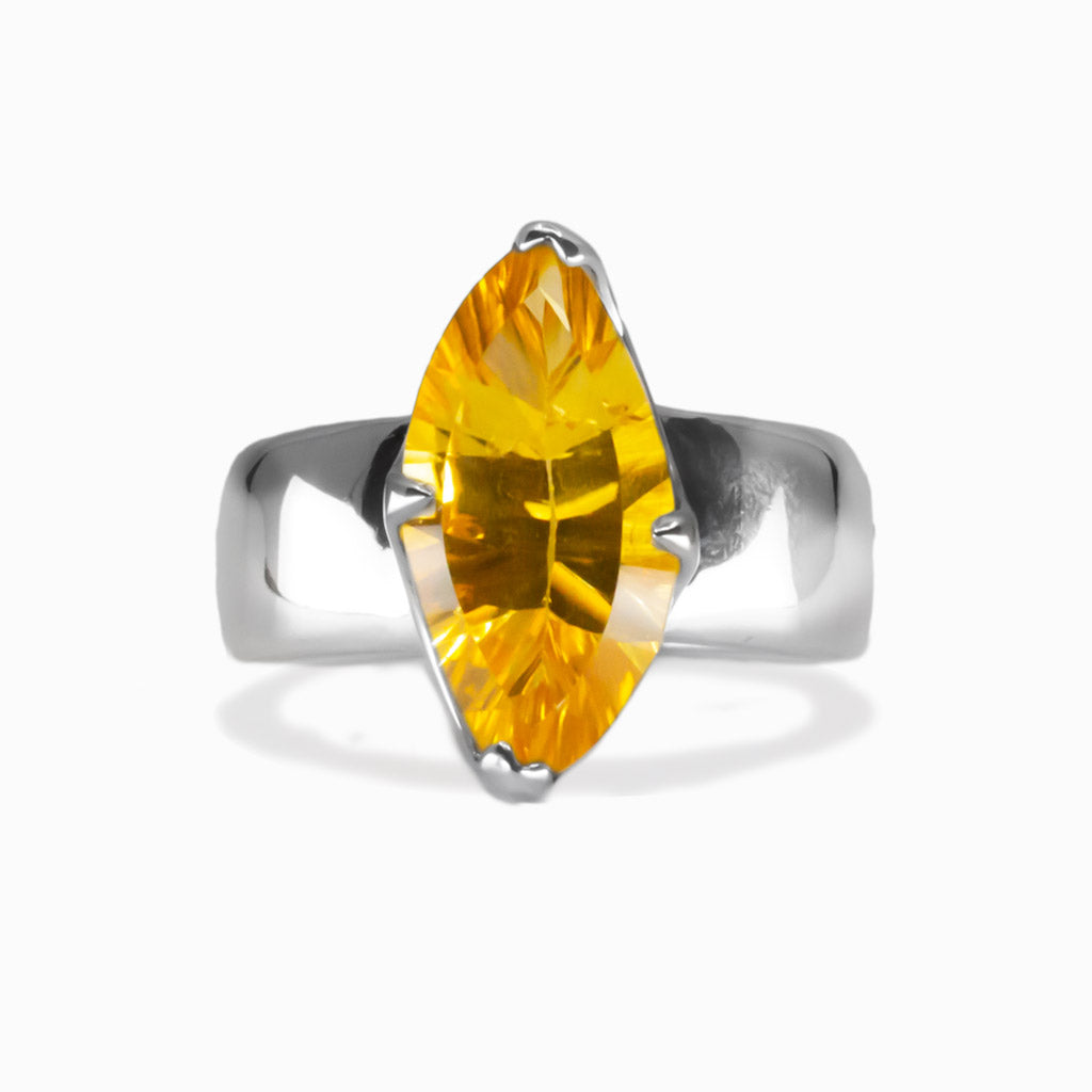 Citrine faceted marquise ring in sterling silver featuring golden-yellow gemstone with brilliant sunlit sparkle. |MADE IN EARTH