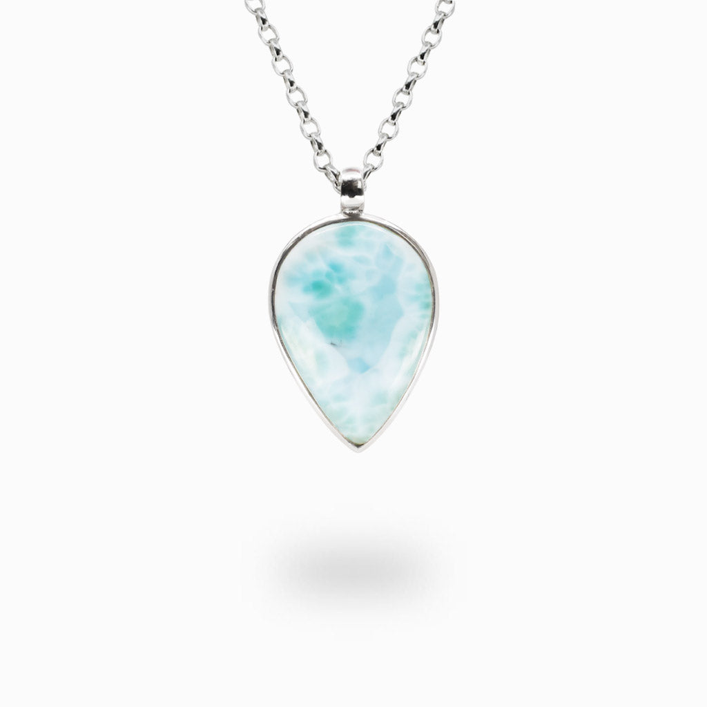 Pear-shaped Larimar gemstone pendant set in sterling silver on silver chain.