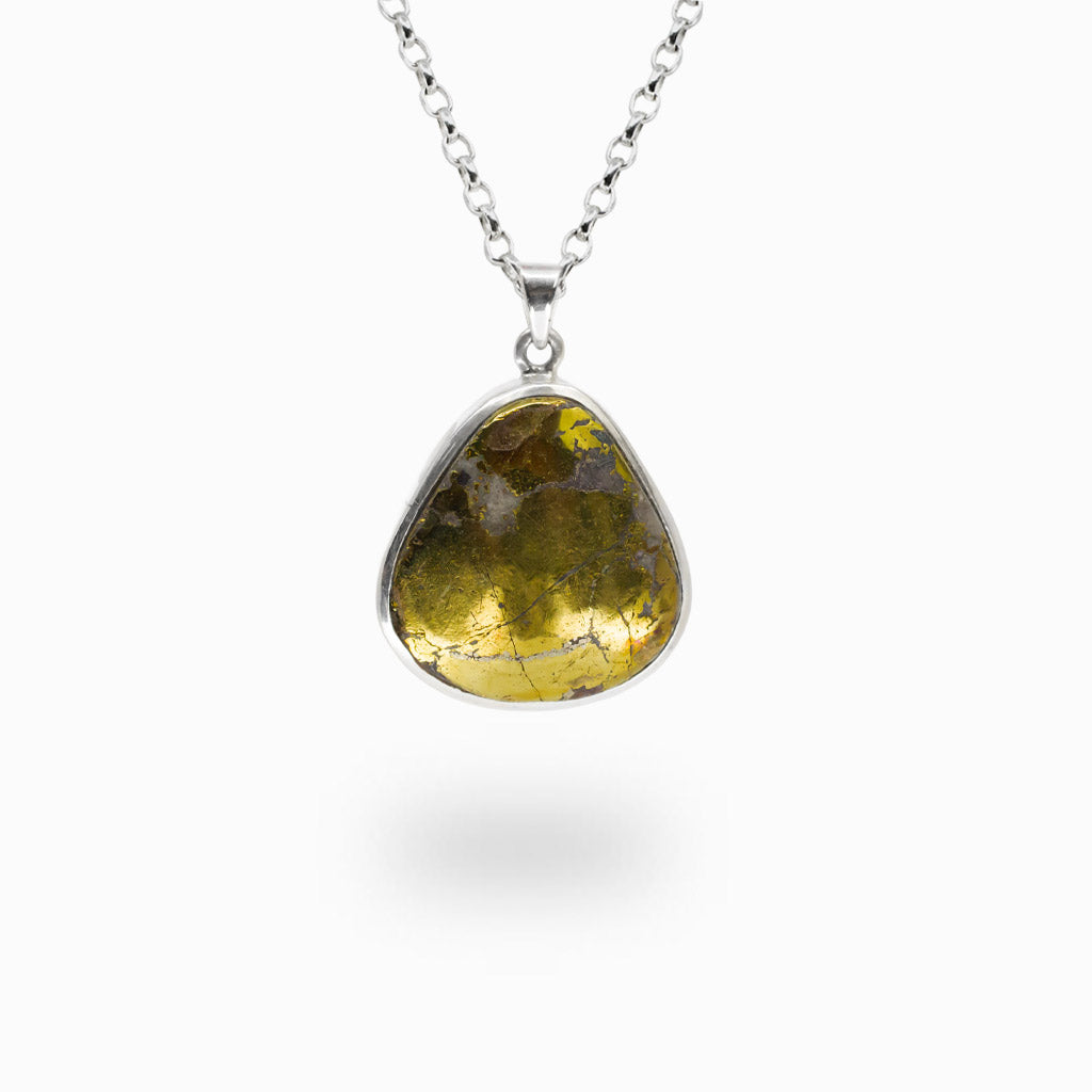 Freeform Pyrite gemstone pendant with natural golden metallic finish set in sterling silver on matching chain.