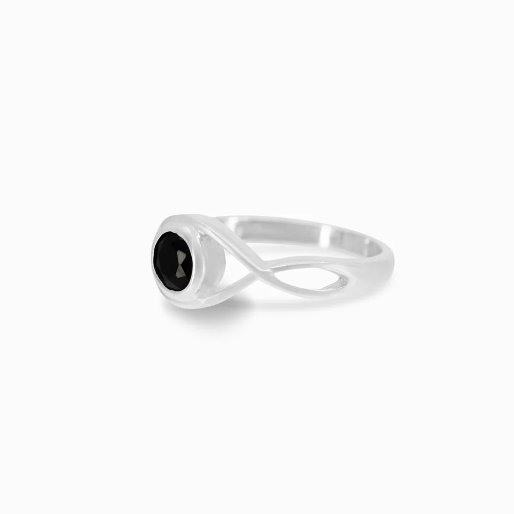 Round faceted Black Onyx gemstone in polished sterling silver eye design ring.