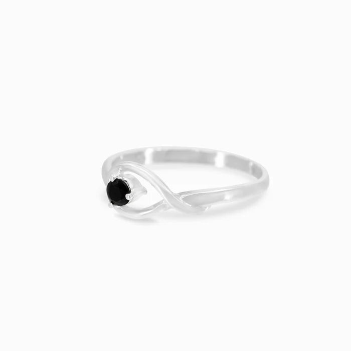Round faceted Black Onyx gemstone prong set in polished sterling silver ring.