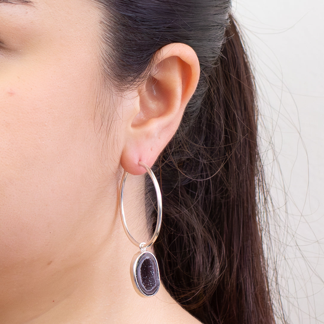 Raw agate geode hoop charms in sterling silver bezel hanging from hoop earrings