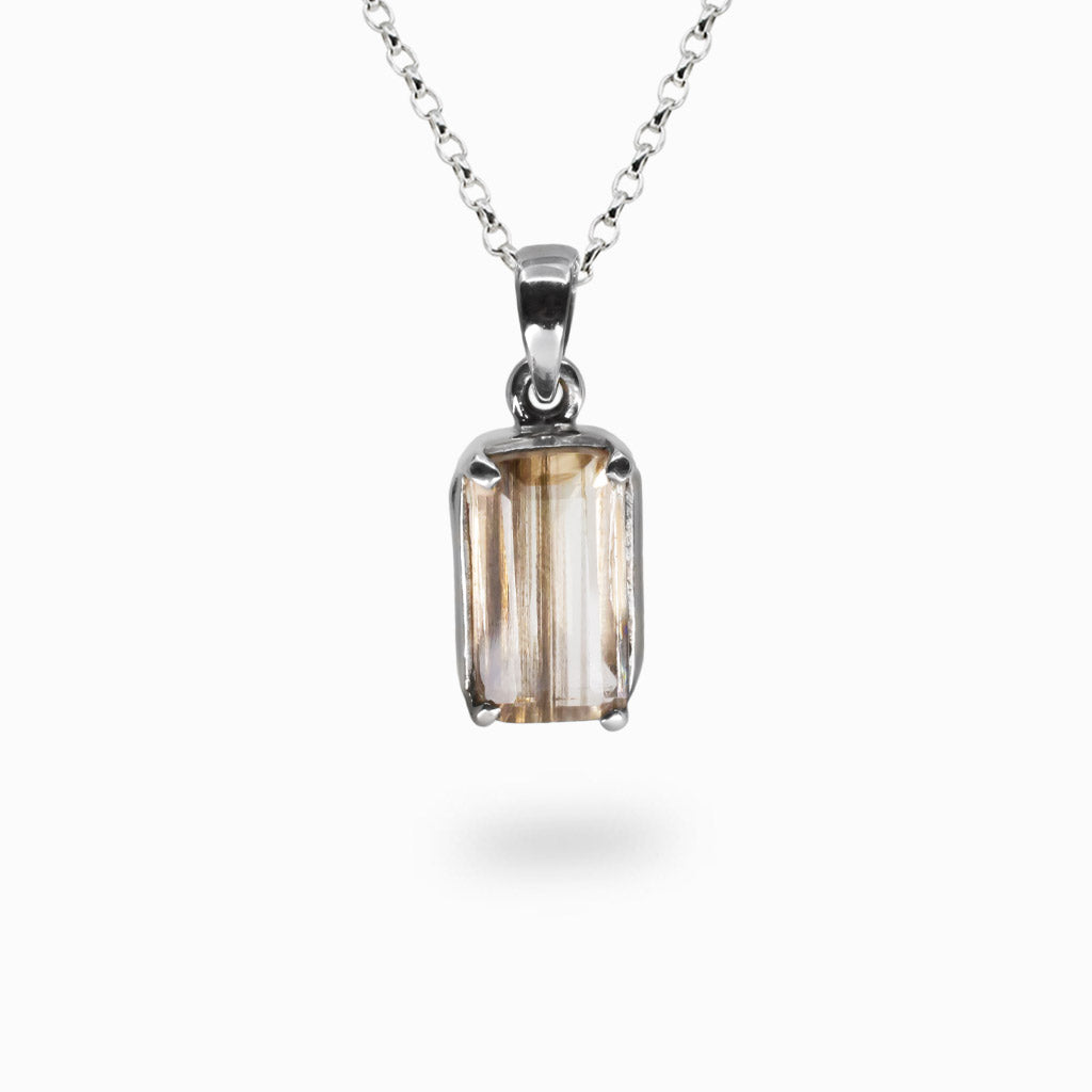 Sterling silver faceted Scapolite rectangle pendant necklace with claw setting. | MADE IN EARTH