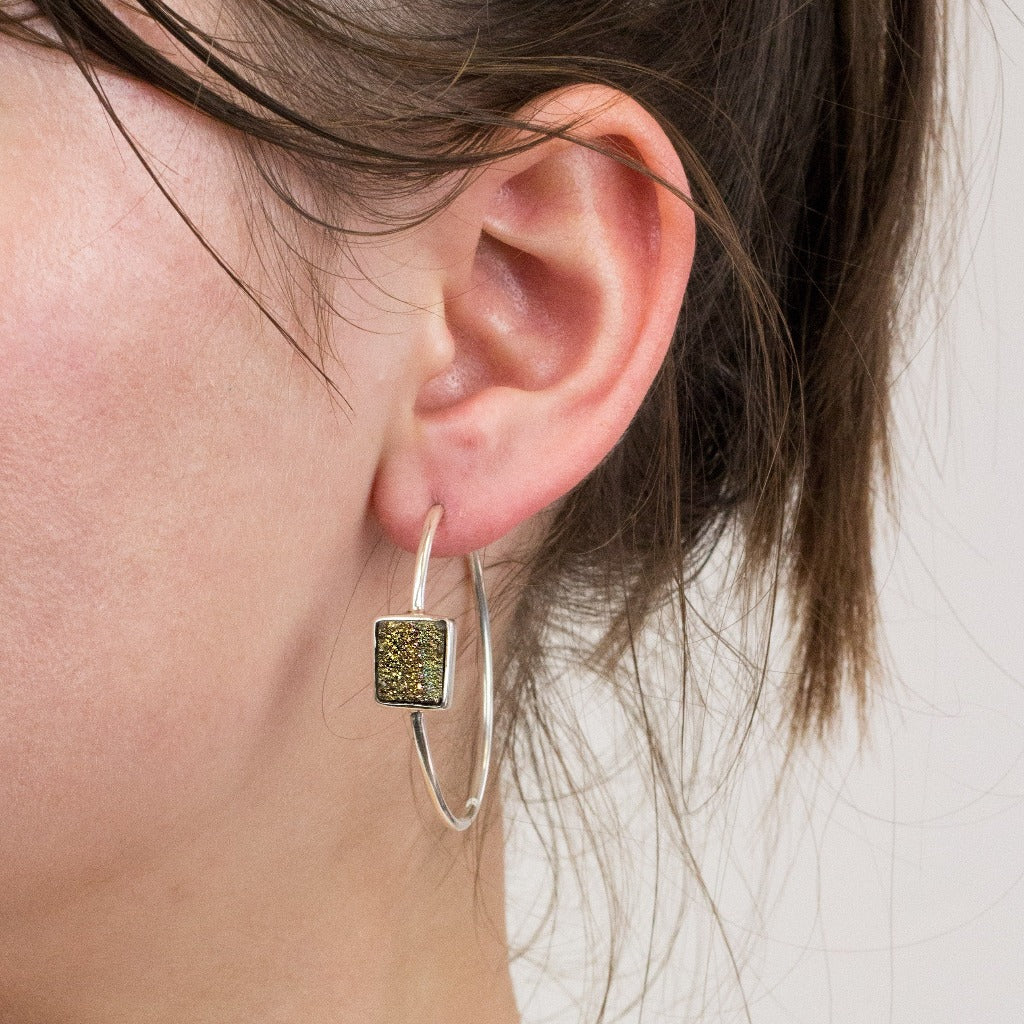 Rainbow Pyrite hoop earrings on model