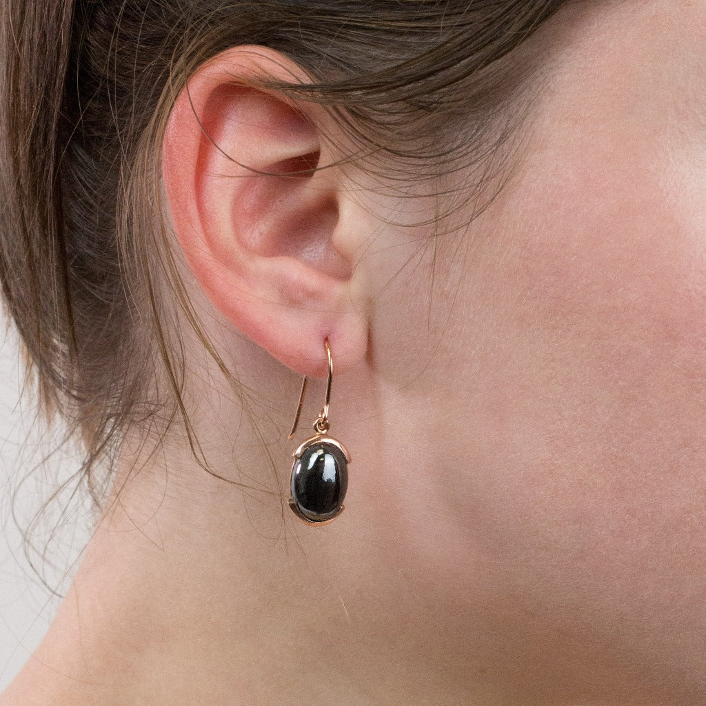 Rose Gold Hematite drop earrings on model
