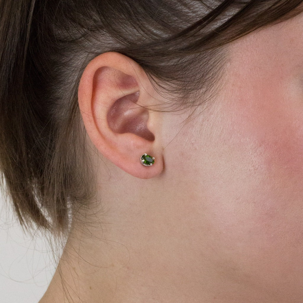 Chrome Diopside stud earrings on model
