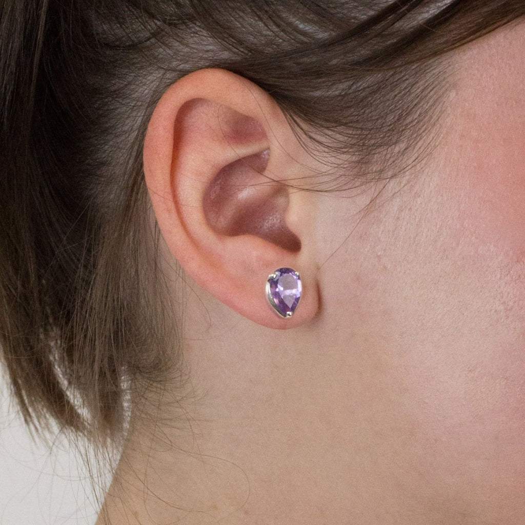 Amethyst stud earrings on model