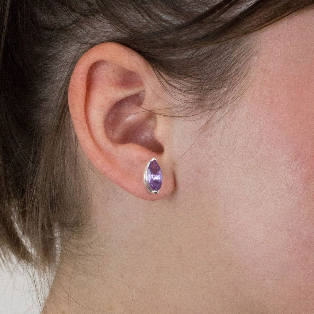 Amethyst stud earrings on model