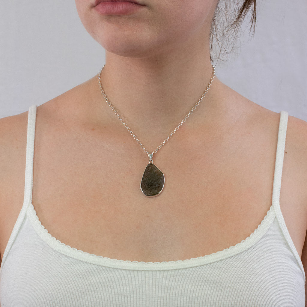 Moldavite necklace on model