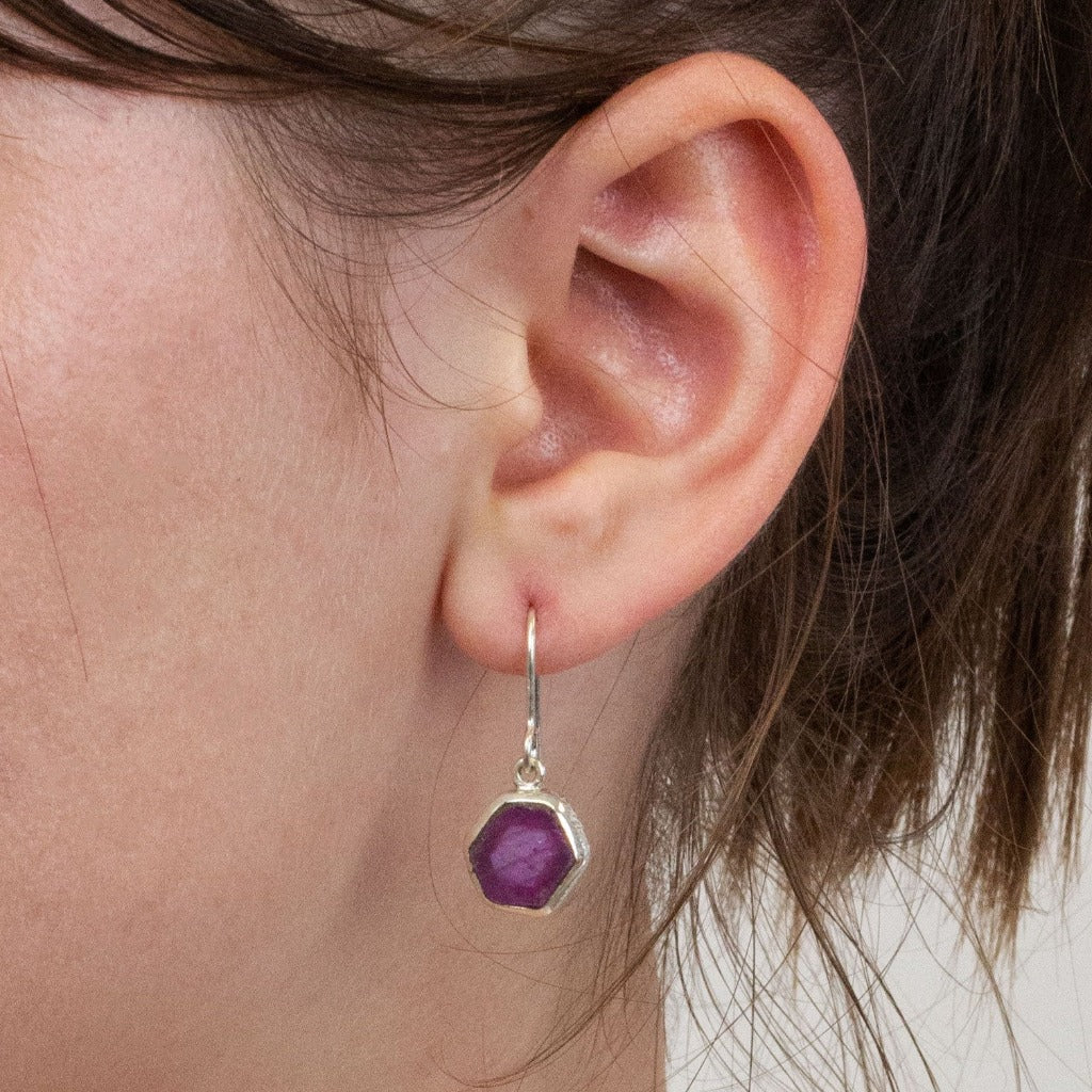 Ruby drop earrings on model