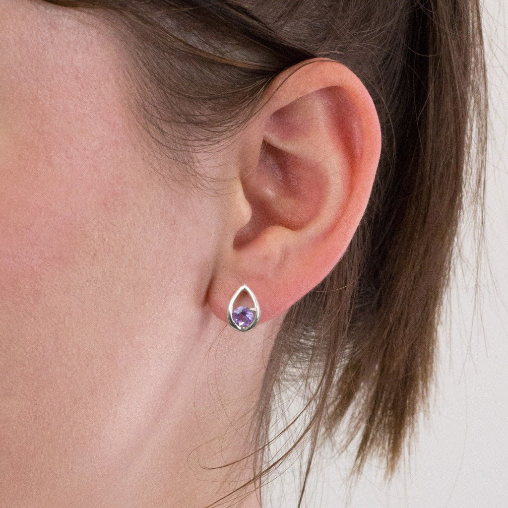 Amethyst stud earrings on model