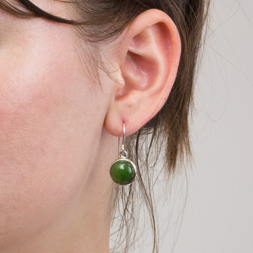 Jade drop earrings on model