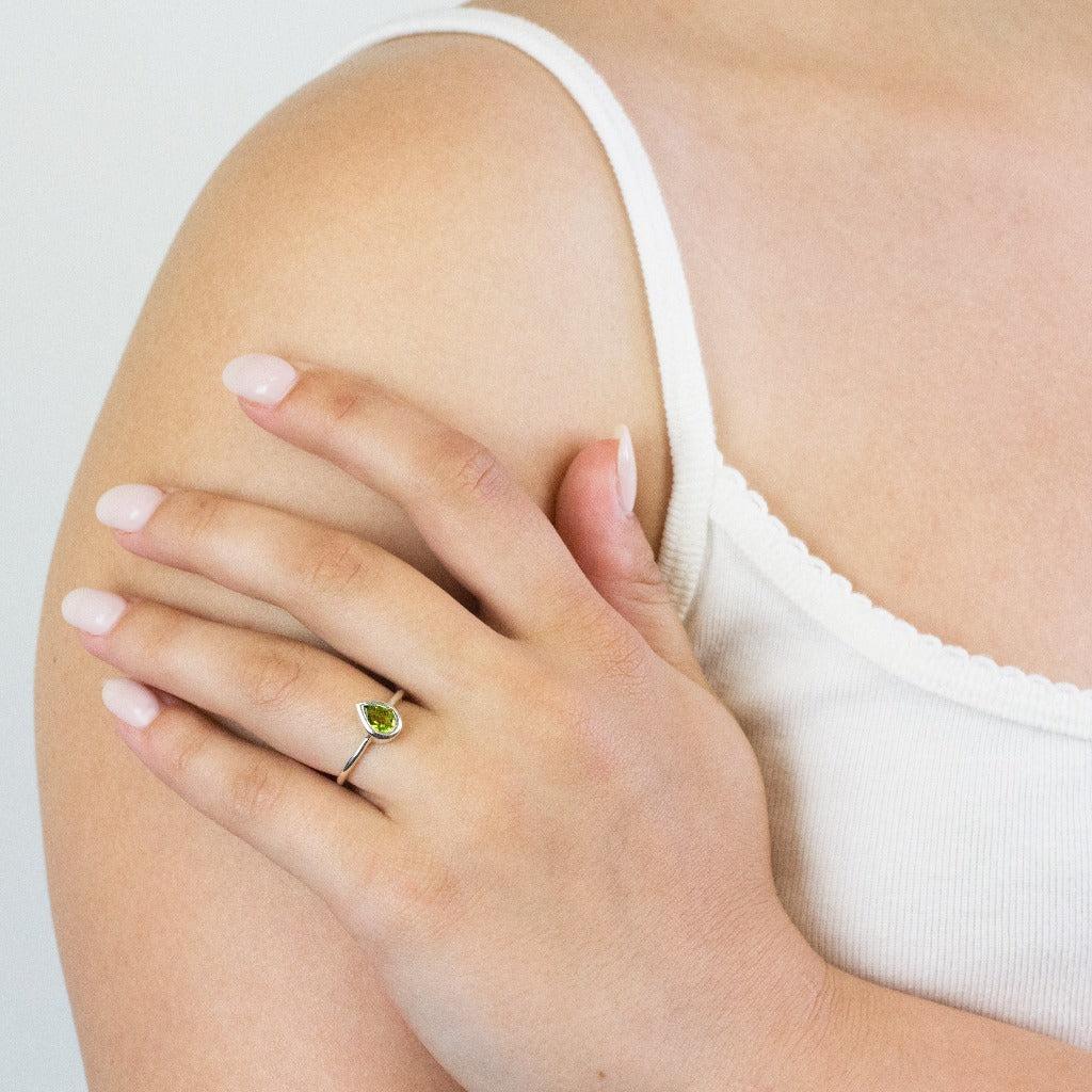 Peridot ring on model