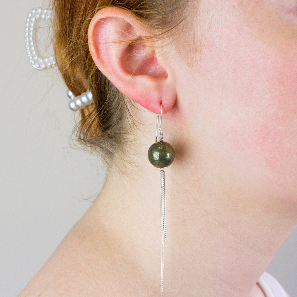 APACHE GOLD DROP EARRINGS ON MODEL