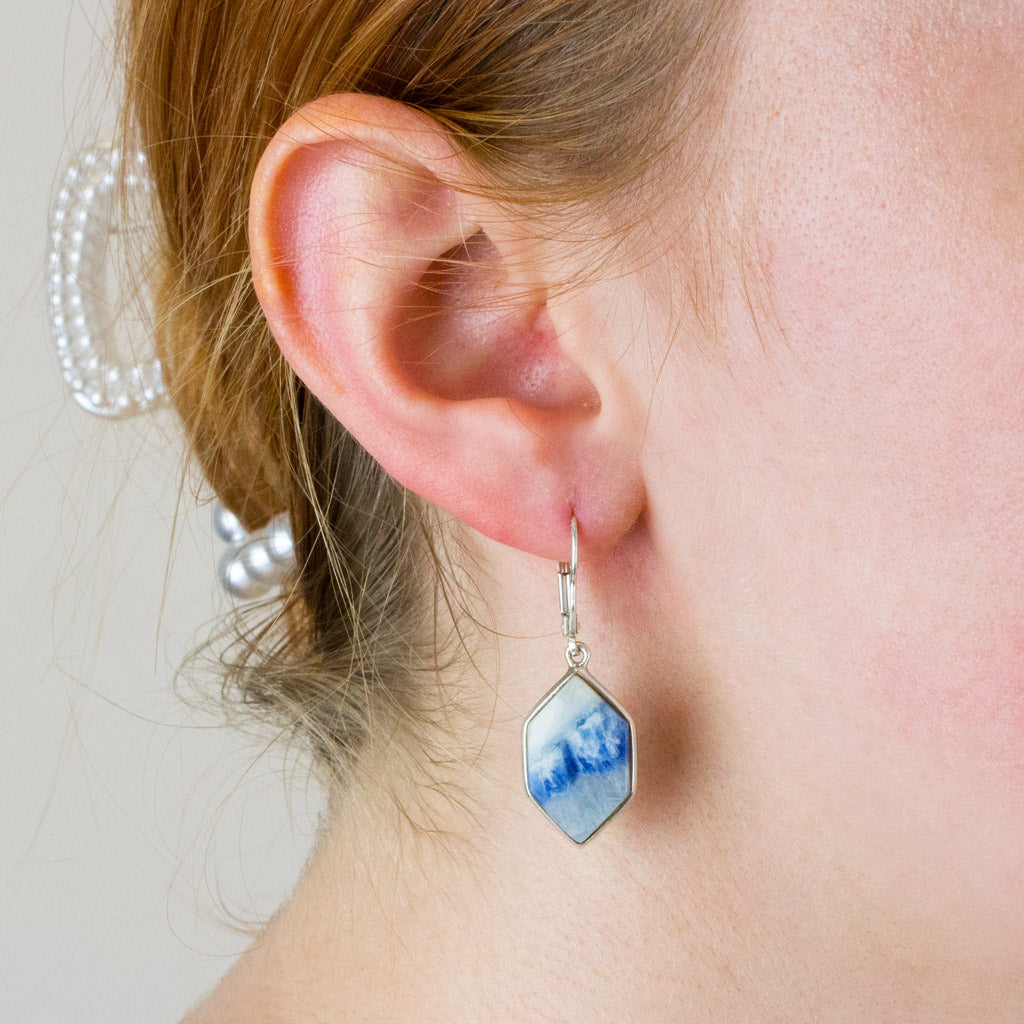Scheelite drop earrings on model