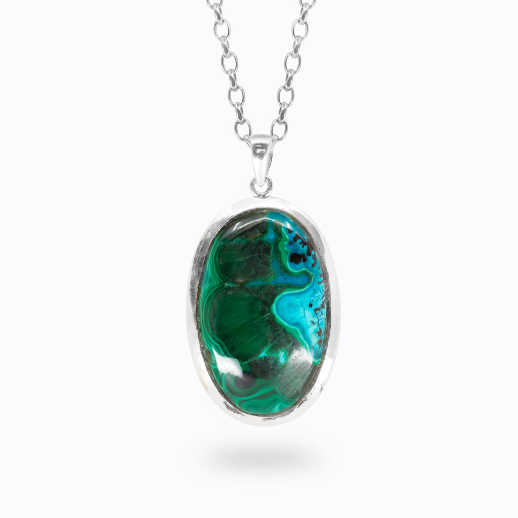 Oval turquoise and green Chrysocolla Malachite pendant set in polished 925 sterling silver.