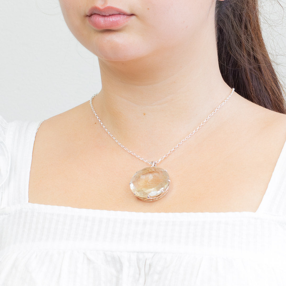 RUTILATED QUARTZ FAC ROUND CLAW STERLING SILVER NECKLACE MADE IN EARTH