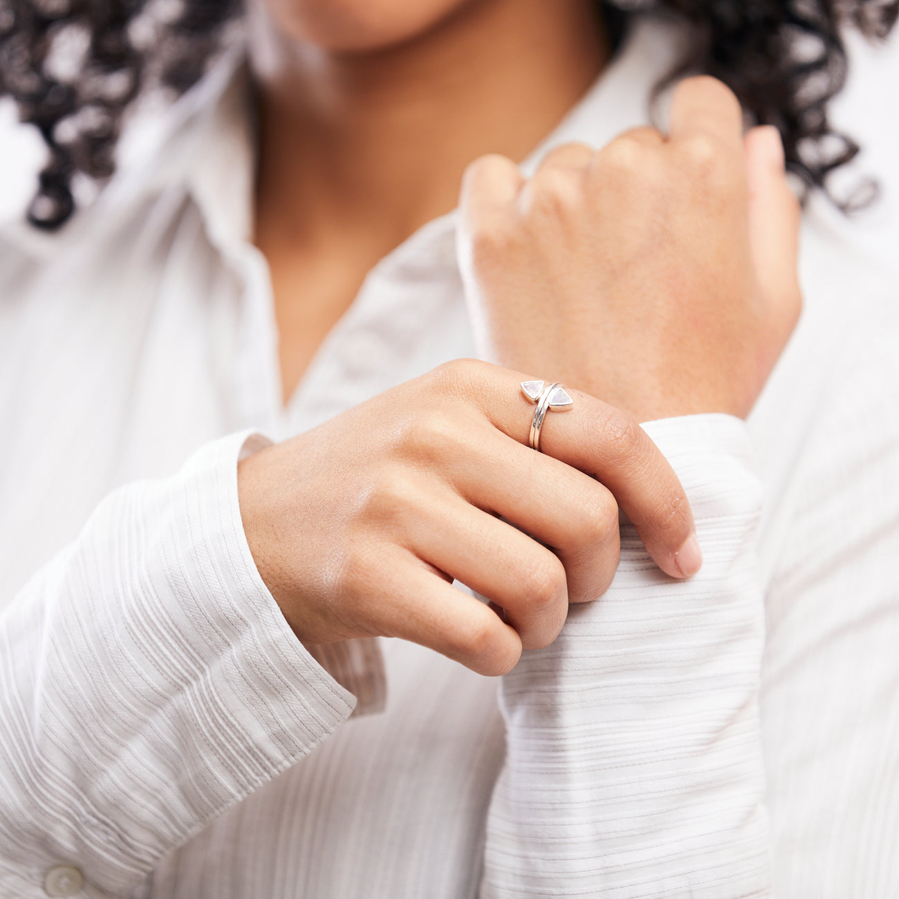 FACETED TRIANGLE RAINBOW MOONSTONE BEZEL RING
