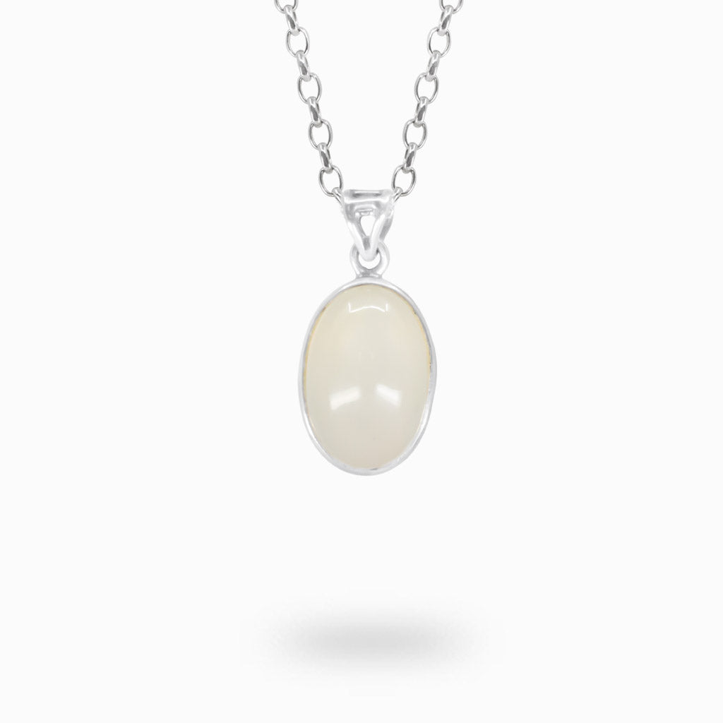 Oval creamy-white Moonstone cabochon pendant in a polished 925 sterling silver bezel setting.
