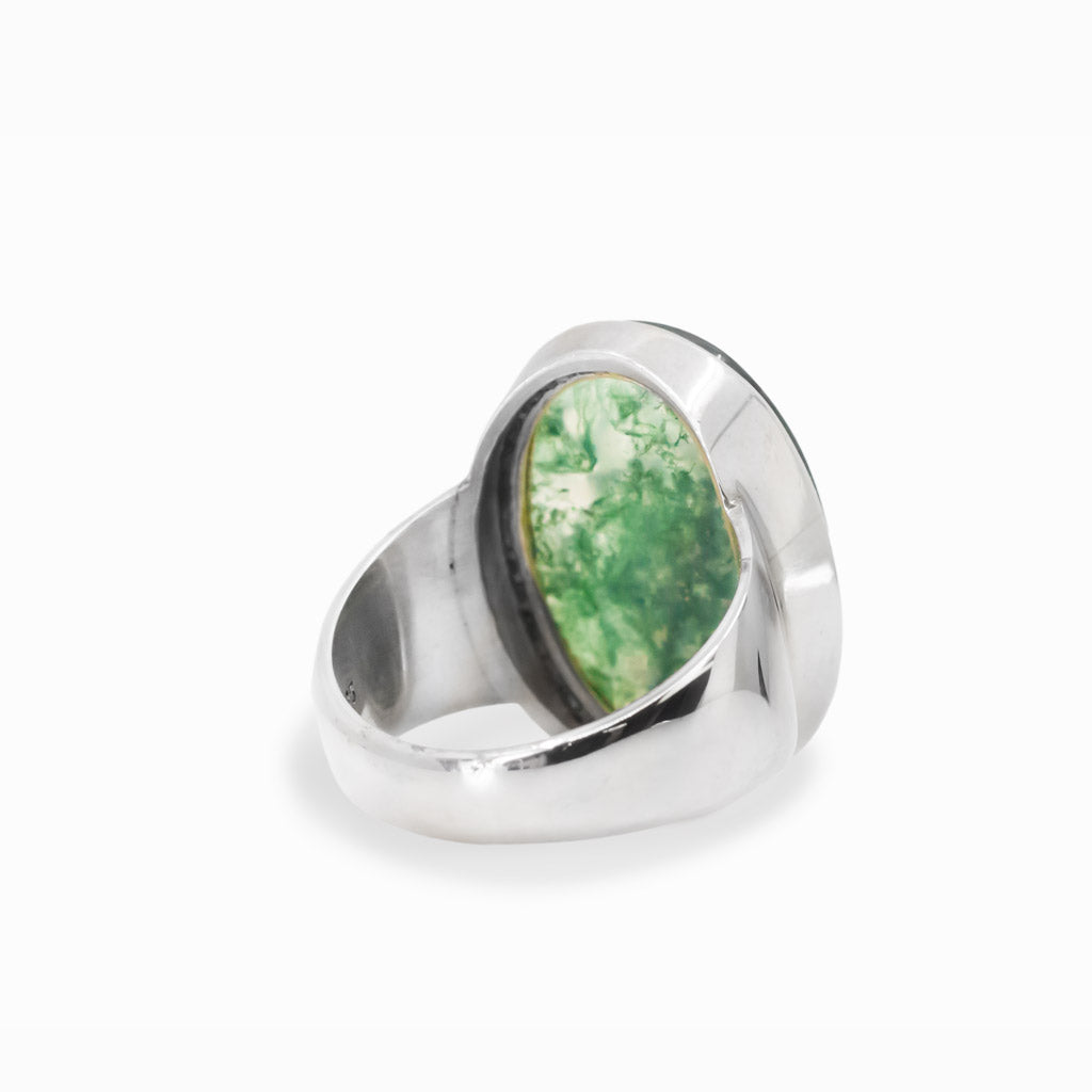 Oval Moss Agate cabochon sterling silver statement ring with natural green moss-like inclusions.