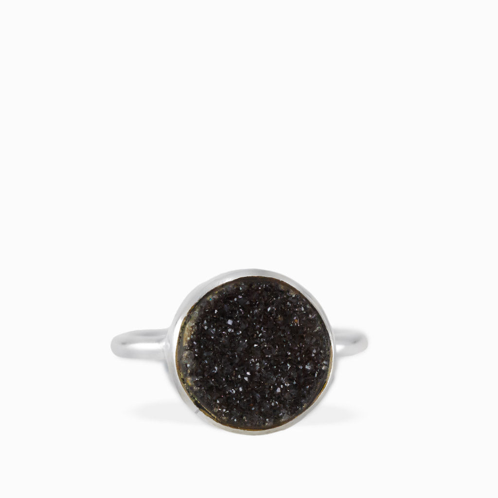 Round Black Onyx Druzy ring with sparkling dark crystalline surface, polished sterling silver bezel setting, and slim band.