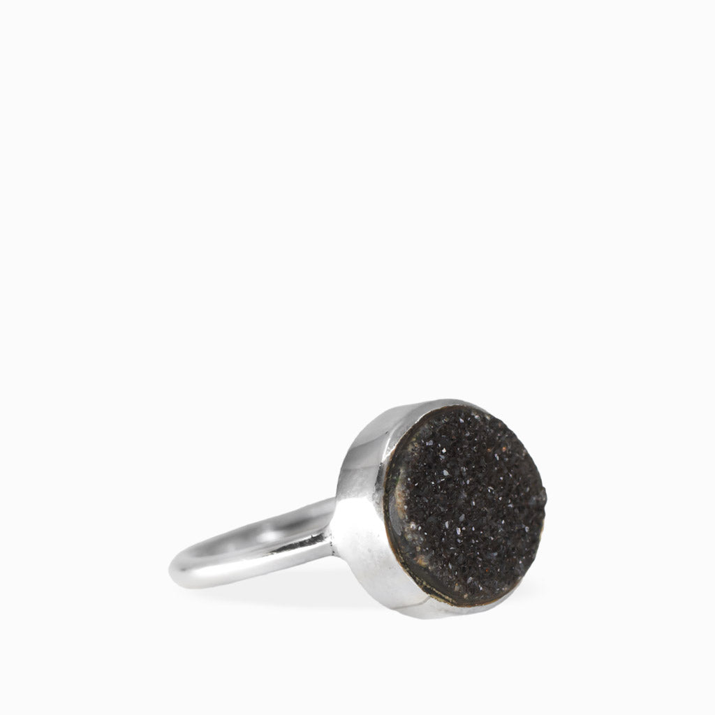 Round Black Onyx Druzy ring with sparkling dark crystalline surface, polished sterling silver bezel setting, and slim band.