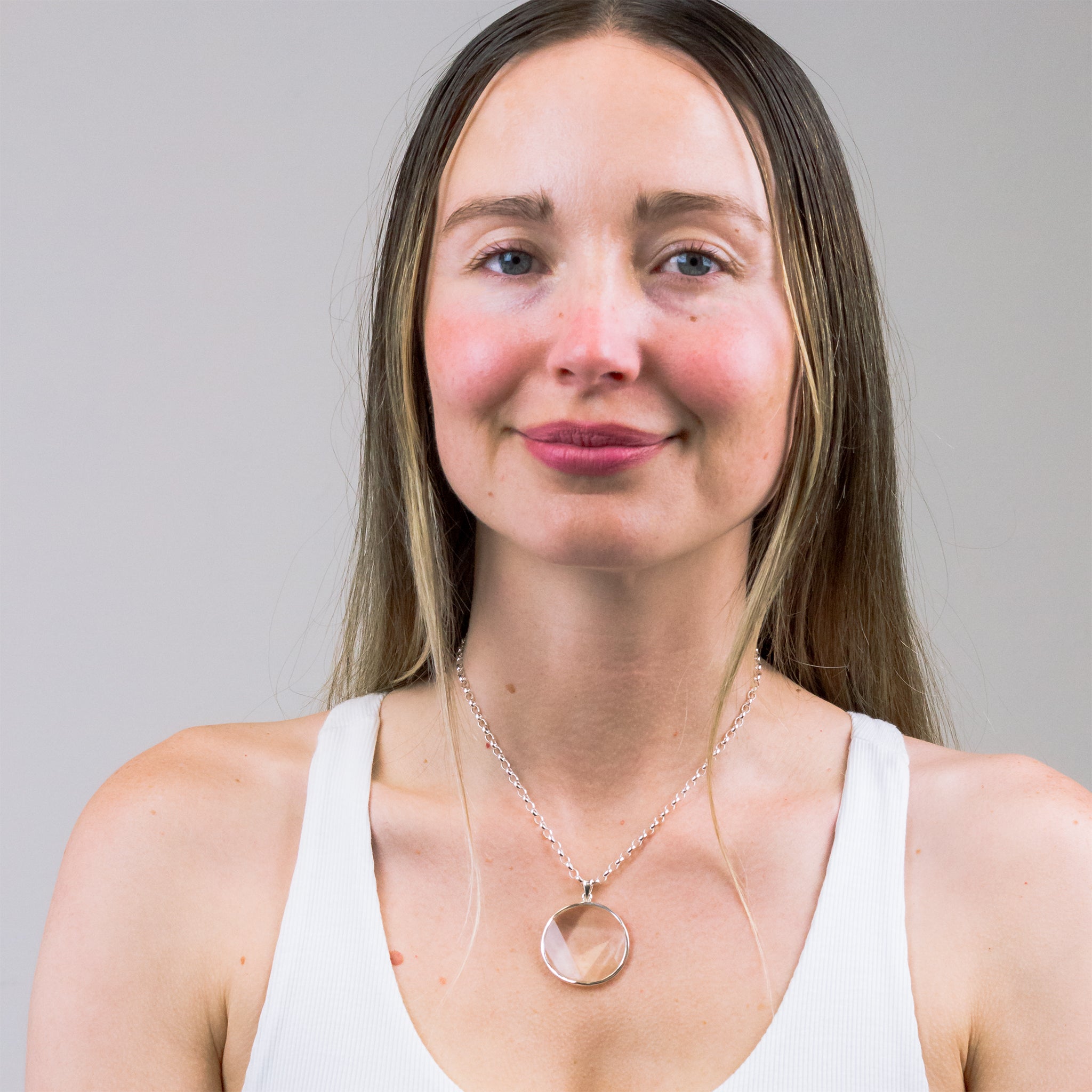 FACETED STAR OF DAVID CLEAR QUARTZ NECKLACE IN STERLING SILVER ON MODEL | MADE IN EARTH