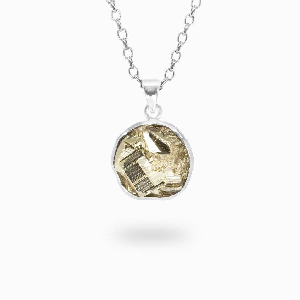 Round metallic gold Pyrite crystal pendant with natural geometric formations set in polished 925 sterling silver.