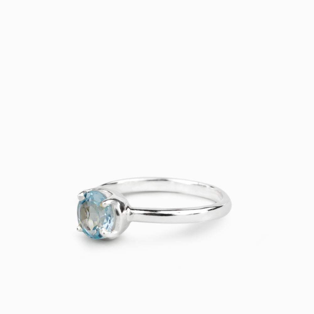 FACETED ROUND BLUE TOPAZ RING