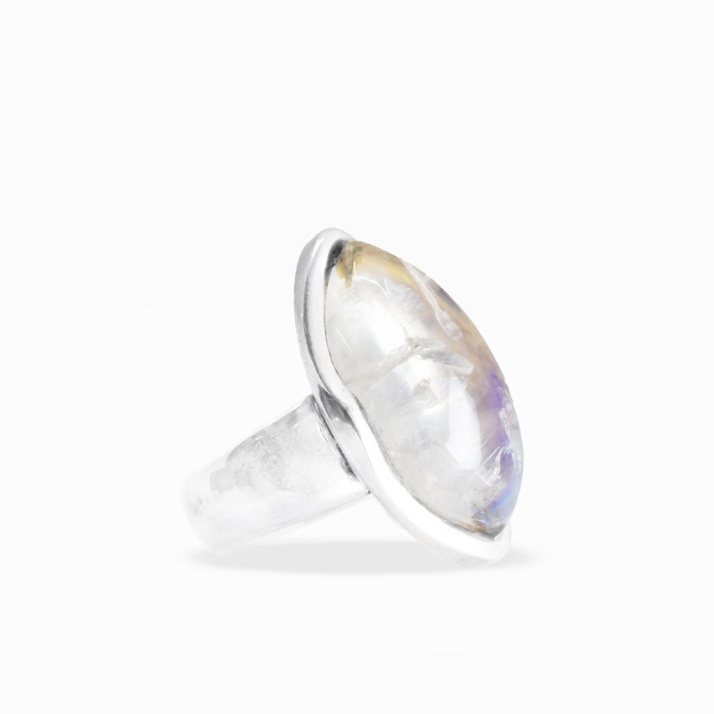 Marquise-shaped Rainbow Moonstone ring with translucent white gemstone, subtle blue flash, and polished sterling silver bezel setting.
