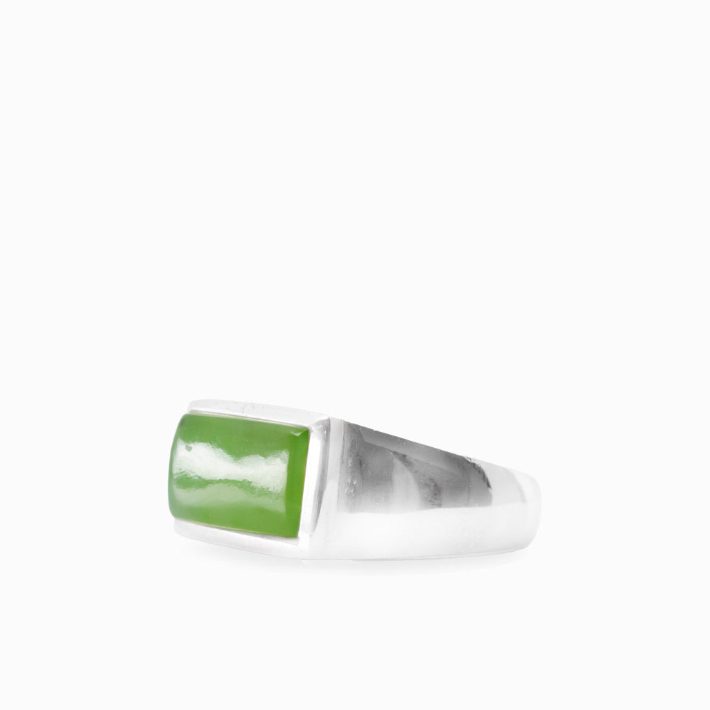 Rectangular green Nephrite Jade cabochon set horizontally in a polished 925 sterling silver ring.