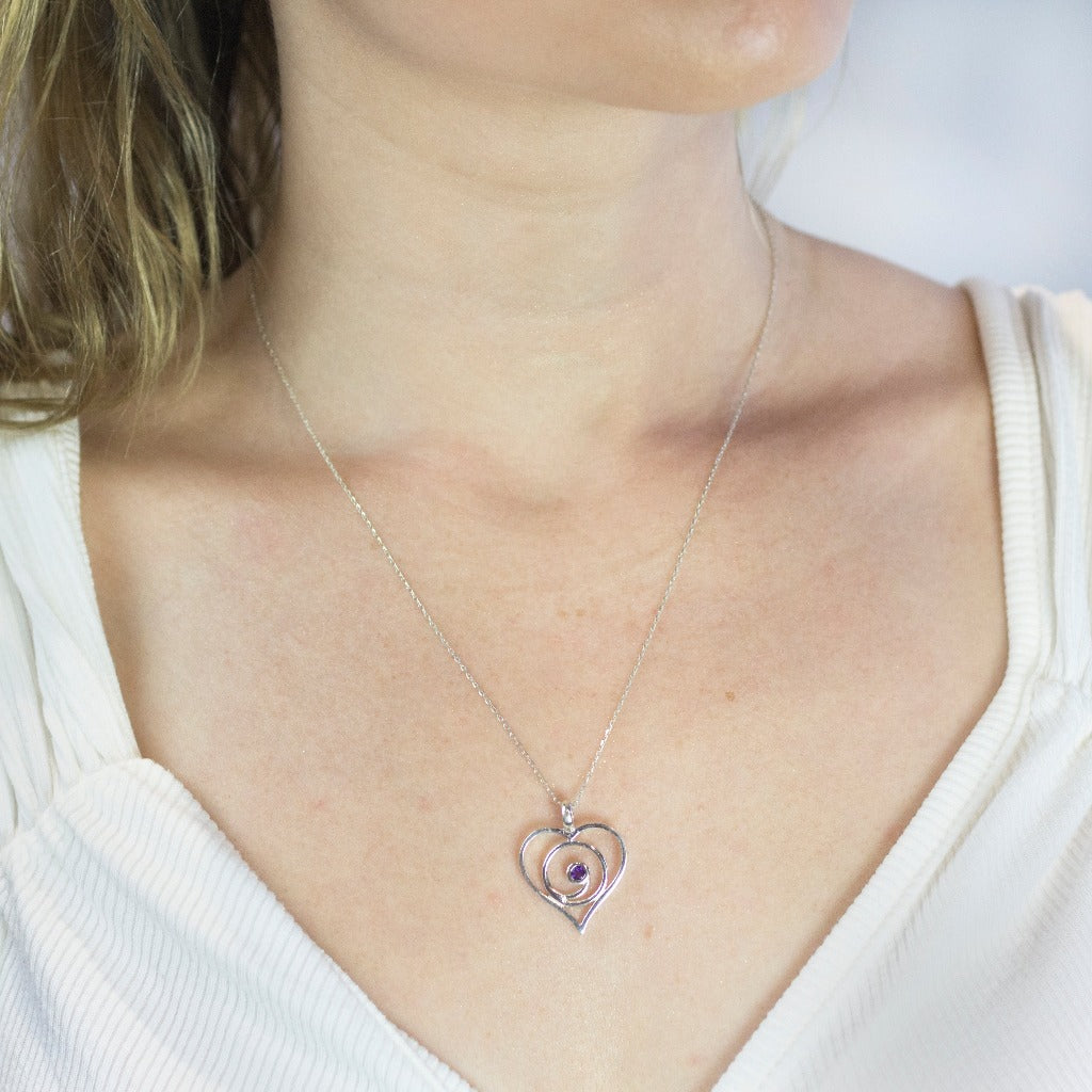 ROUND PURPLE FACETED STERLING SILVER HEART AMETHYST NECKLACE ON MODEL