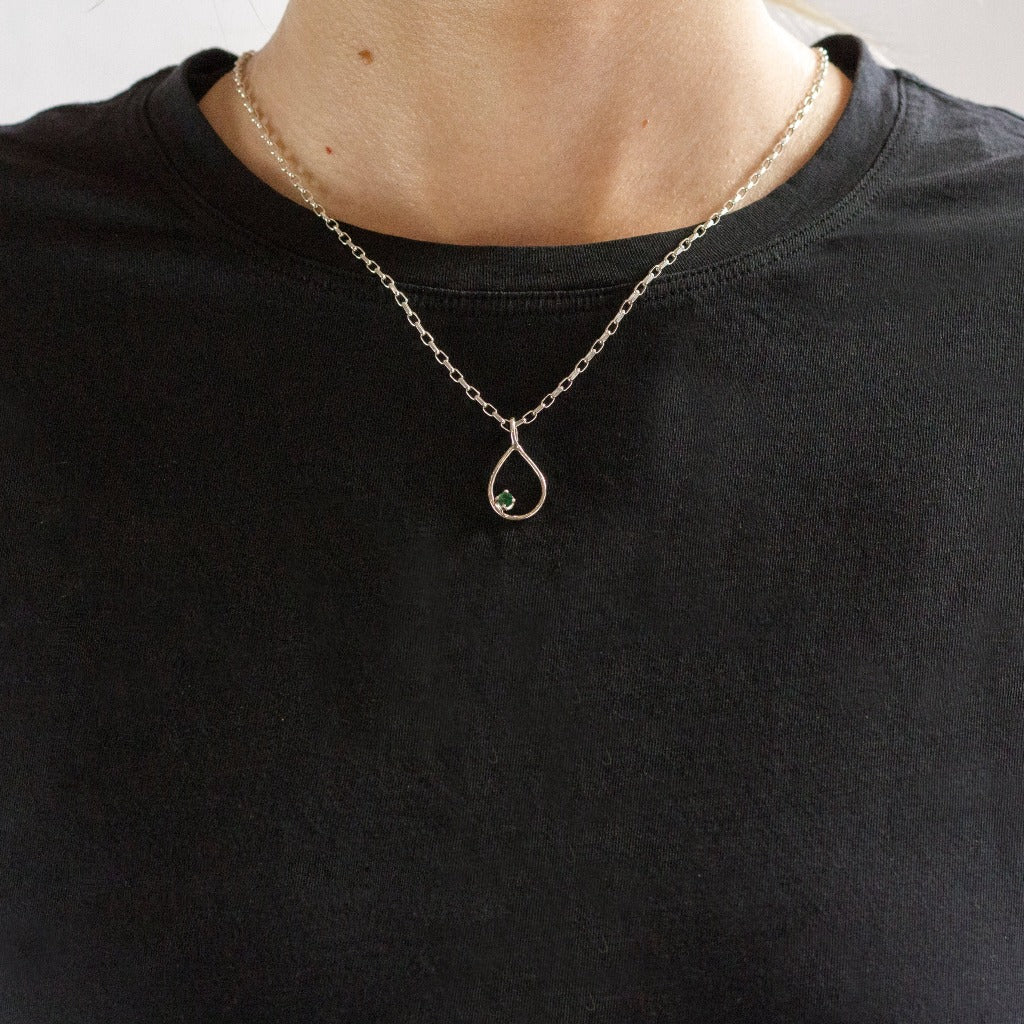Green Emerald stone set in teardrop silver frame Emerald Necklace made in earth on Model