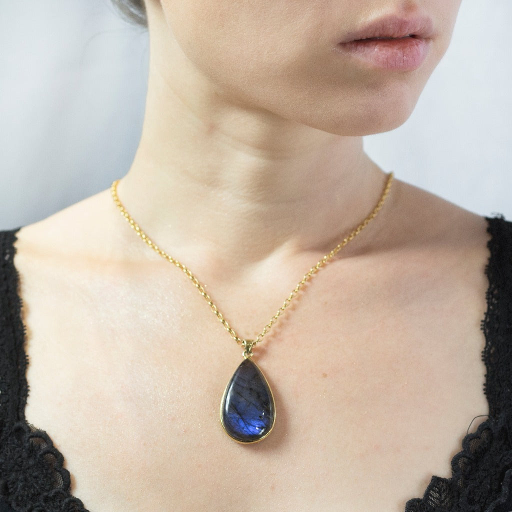 Yellow and Purple Hued Teardrop Labradorite Stone set in Vermeil Gold Labradorite Necklace on model