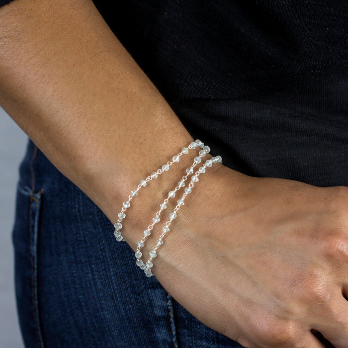 Aquamarine beaded chain modeled as bracelet