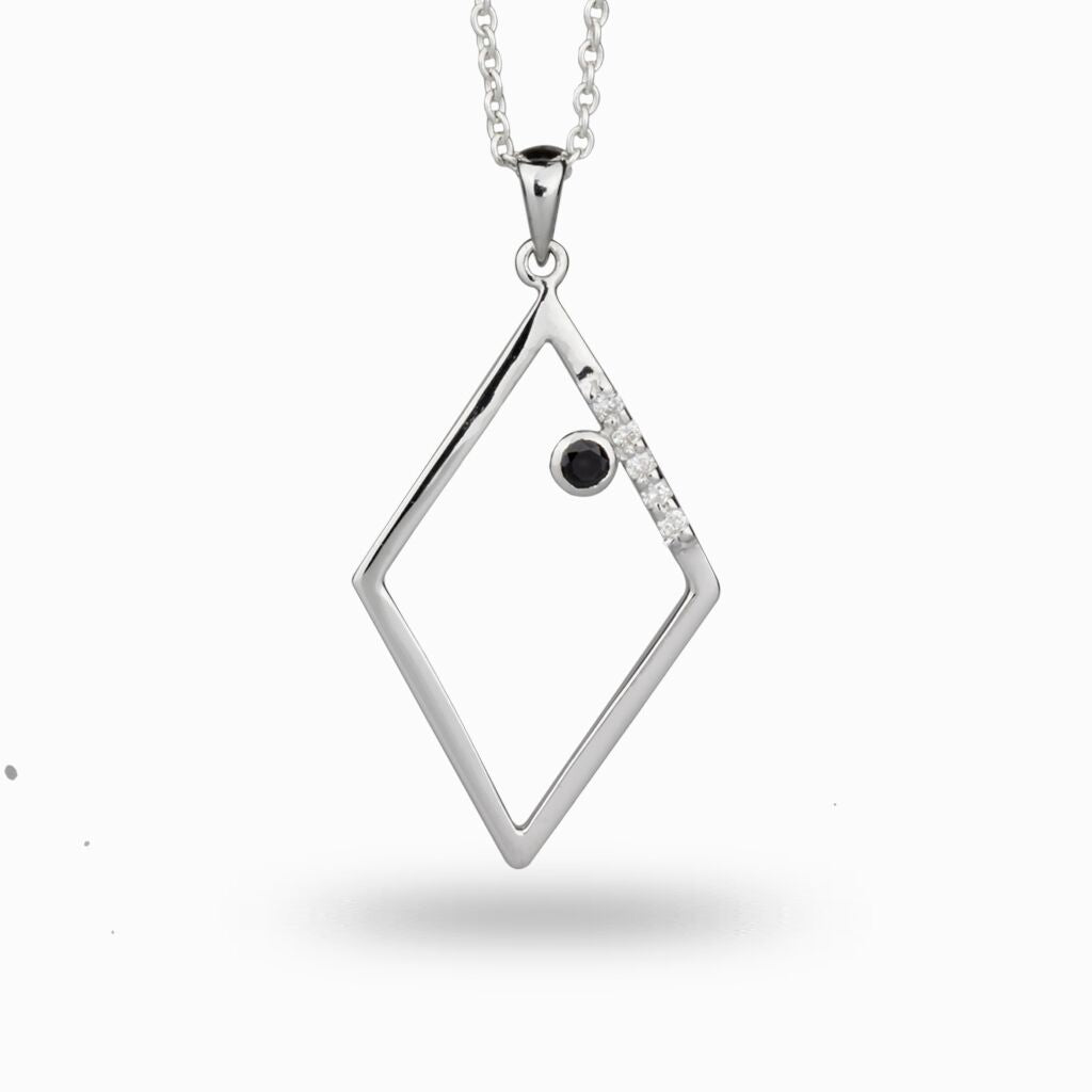Black Spinel stone accented with diamonds on a rectangular figure Diamond and Black Spinel necklace made in earth