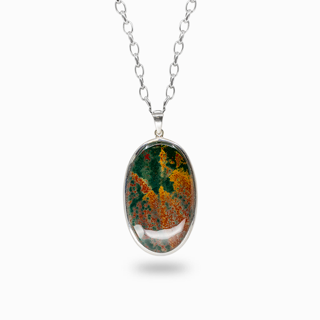 Oval Bloodstone pendant necklace with dark green, red, and golden inclusions in a polished sterling silver bezel setting.