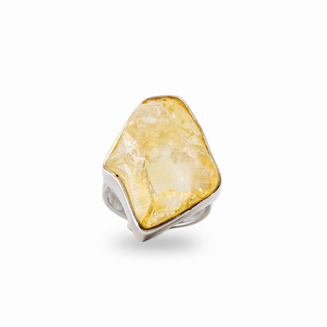 Raw golden-yellow Citrine crystal in an organic freeform sterling silver ring setting.